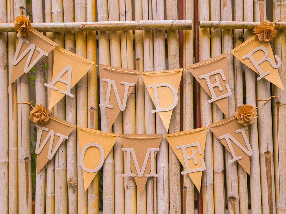 Wander Women gold sign