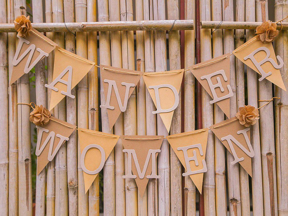 Wander Women gold sign