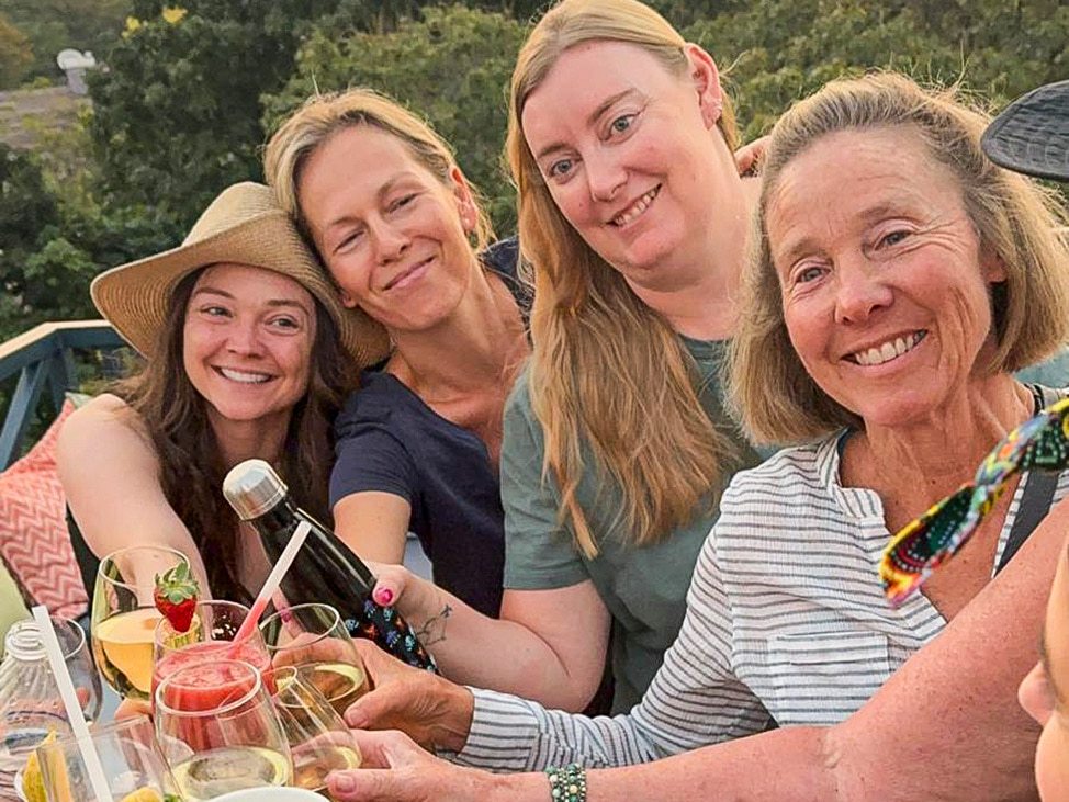 Wander Women cheering with drinks